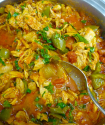 Curried chicken with green pepper, tomato, garnished with cilantro